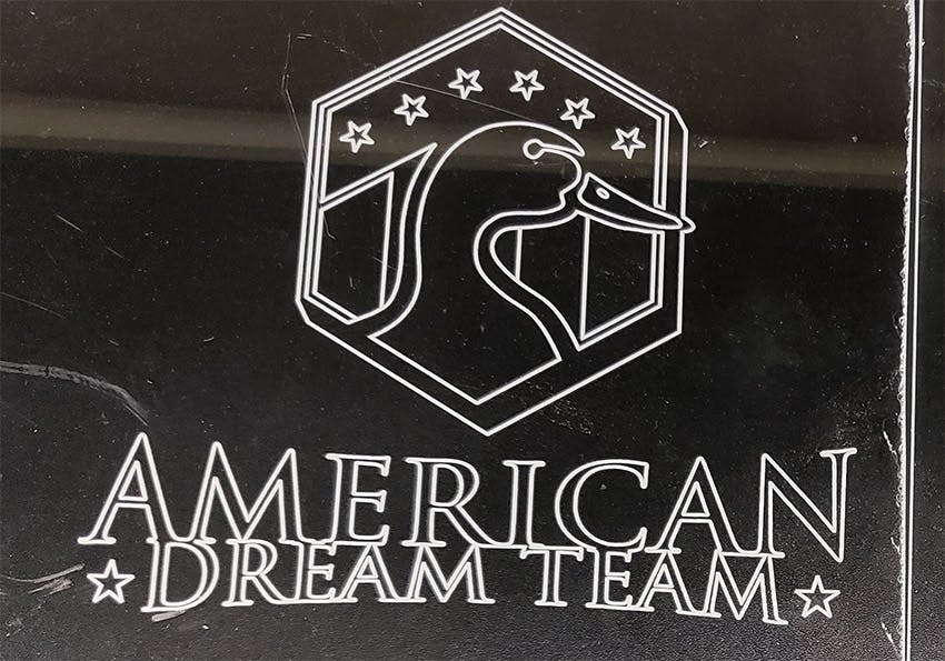 A laser engraved logo made for American Dream Team